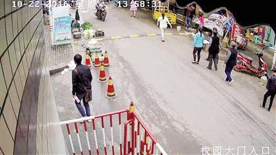 雙橋入室盜竊案，監(jiān)控視頻截圖紅圈處為犯罪嫌疑人。 本報(bào)記者 雷鍵 通訊員 葉文廣 攝